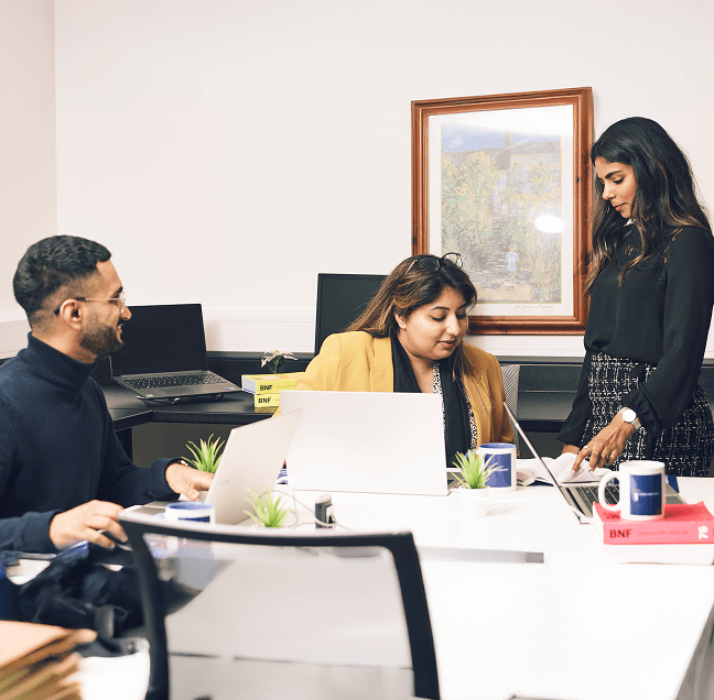 Candid image of BCS team while working
